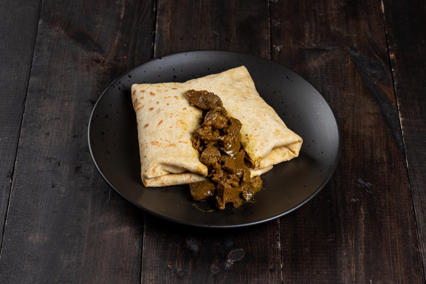 Curry goat roti